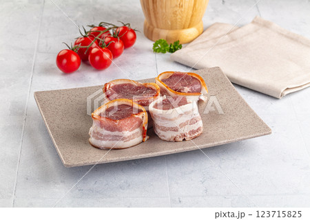 Raw pork tenferloin with bacon Raw pork tenferloin with bacon 123715825