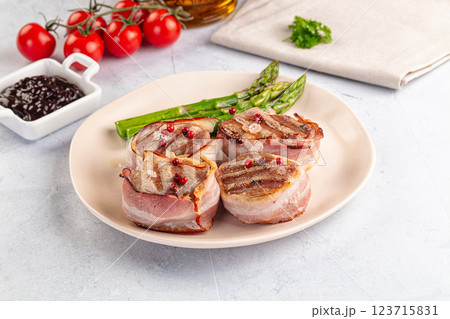 Tasty grilled pork medallion with bacon 123715831