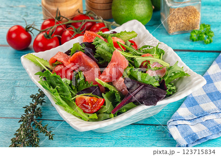 Salad with salmon and arugula 123715834