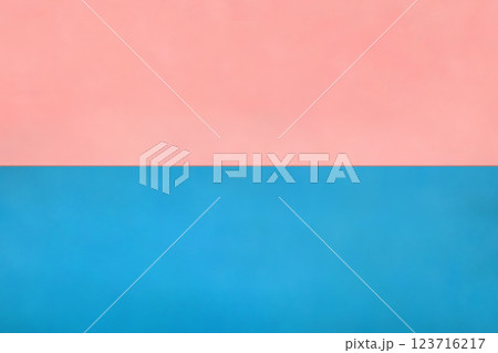 上下に分かれたサーモンピンクと青色の紙 123716217