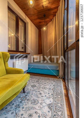Cozy Corner with Yellow Armchair and Blue Mattress Cozy Corner with Yellow Armchair and Blue Mattress 123716607