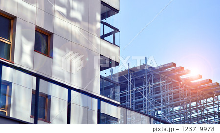 Modern and new apartment building. Multistoried modern, new and stylish living block of flats. Modern and new apartment building. Multistoried modern, new and stylish living block of flats. 123719978