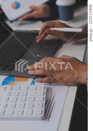 Accounting company provide finance and taxation planning for profitable cash flow, Auditor and accountant team working in office, analyze financial data and accounting record with calculator.Insight Accounting company provide finance and taxation planning for profitable cash flow, Auditor and accountant team working in office, analyze financial data and accounting record with calculator.Insight 123723406