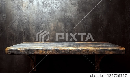A rustic wooden shelf is mounted on a dark textured wall. Concept of simplicity and vintage decor. 123726537