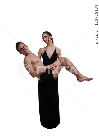Romantic couple poses in elegant lingerie setting with playful intimacy 123728138