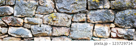 Wide shot of handmade stone wall background.Natural stone background. 123729714