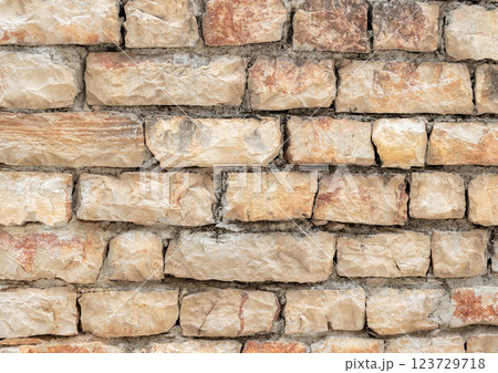 Baked mud brick wall. Old building. For design. Baked mud brick wall. Old building. For design. 123729718