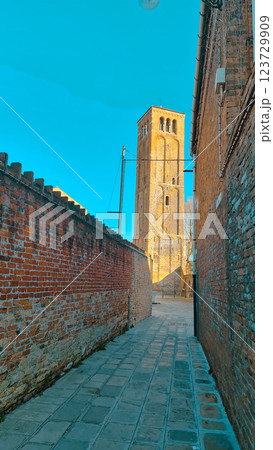 Venice street with brick walls Venice street with brick walls 123729909