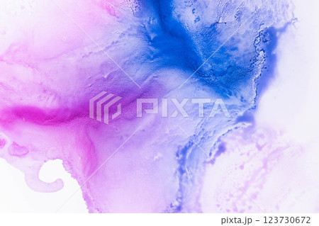 Colorful patterns emerge from fluid ink in shades of pink and blue, creating a vibrant abstraction. Colorful patterns emerge from fluid ink in shades of pink and blue, creating a vibrant abstraction. 123730672
