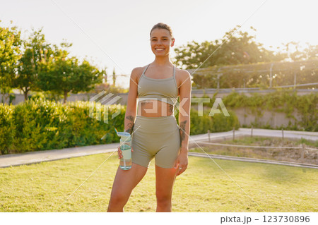A Fitness Enthusiast Enjoys an Outdoor Workout Surrounded by Beautiful Nature and Scenery 123730896