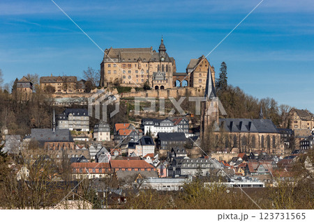 The Marburg Castle, also called Landgrave's Castle, and the Lutheran Parish Church (r) above the old town of Marburg, Hesse, Germany, Europe 123731565
