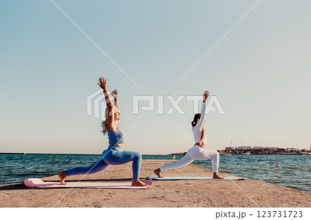 Yoga Beach Couple Pose Workout Exercise Yoga Beach Couple Pose Workout Exercise 123731723