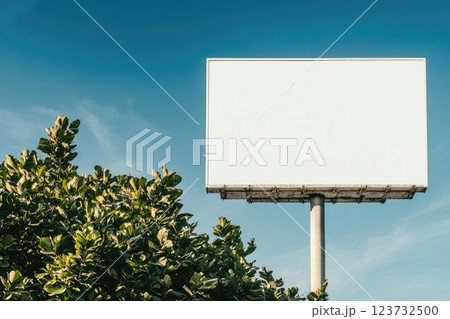 Empty Billboard in Urban Setting Against Blue Sky 123732500