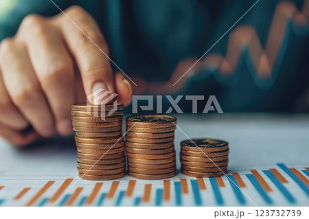 Stacking Coins Close Up with Financial Background 123732739