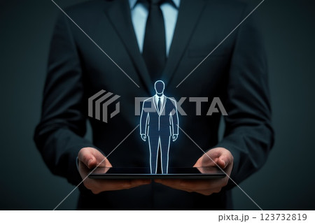 Business Professional Holding Tablet Displaying Virtual Recruiter Concept Business Professional Holding Tablet Displaying Virtual Recruiter Concept 123732819
