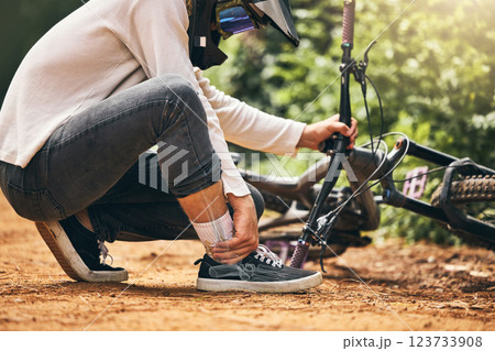 Man, ankle pain and abstract injury in dirtbike sports for wellness exercise, training and health workout in Norway forest. Fitness stress, burnout and medical emergency or leg accident for cyclist Man, ankle pain and abstract injury in dirtbike sports for wellness exercise, training and health workout in Norway forest. Fitness stress, burnout and medical emergency or leg accident for cyclist 123733908