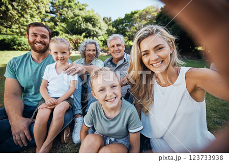 Family selfie, park portrait and woman with smile on holiday in nature in Canada during summer. Parents, girl kids and grandparents taking photo on vacation in a green garden for picnic in spring 123733938