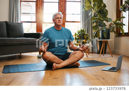 Yoga, online and meditation with a senior man following a zen fitness class for workout, exercise and training. Laptop, health and retirement with an elderly male pensioner exercising in his home 123733976