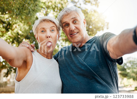Fitness senior couple with selfie and outdoor hiking, exercise or workout together for healthy, wellness or retirement lifestyle. Crazy, adventure park training with elderly people in nature portrait 123733988