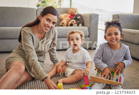 Mother, baby and child on carpet for education, learning and teaching in their living room home with happy portrait. Young mom from Mexico with kids play time, mindset growth development with puzzle Mother, baby and child on carpet for education, learning and teaching in their living room home with happy portrait. Young mom from Mexico with kids play time, mindset growth development with puzzle 123734025