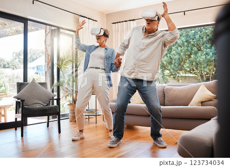VR experience, senior couple and living room metaverse video games innovation, digital fantasy and cyber connection. Crazy man, happy woman and excited people with virtual reality futuristic glasses 123734034