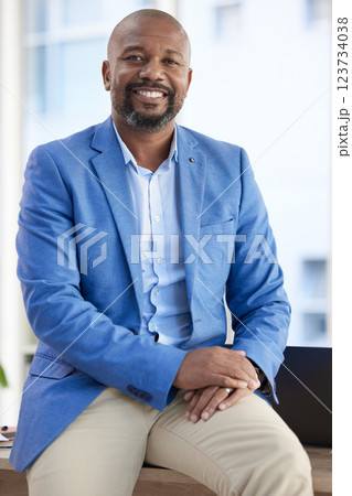 Black man, entrepreneur and businessman success in a office with proud company vision. Startup boss, manager and leadership portrait of a senior ceo happy about working and workplace growth 123734038