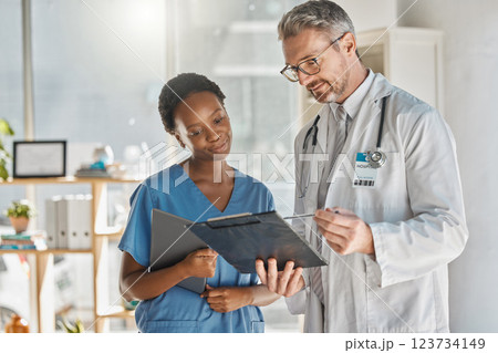Student nurse and doctor document review in hospital for professional opinion on treatment. Medical people working together for efficient healthcare strategy, communication and understanding. 123734149