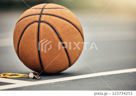 Basketball, sport and whistle with a ball on a court outside for fitness, exercise or sports training. Workout, health and game with no one at an empty venue for cardio and health lifestyle 123734251