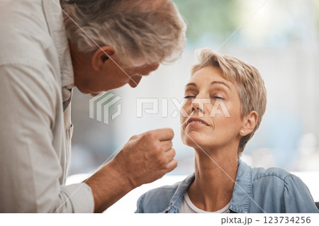 Covid, health and senior couple with pcr test in home for corona virus compliance, wellness or safety together with easy check. Care, love and support elderly people with covid 19 nose medical swab Covid, health and senior couple with pcr test in home for corona virus compliance, wellness or safety together with easy check. Care, love and support elderly people with covid 19 nose medical swab 123734256