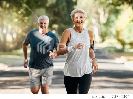 Retirement, couple and running fitness health for body and heart wellness with natural ageing. Married, mature and senior people enjoy nature run together for cardiovascular vitality workout. Retirement, couple and running fitness health for body and heart wellness with natural ageing. Married, mature and senior people enjoy nature run together for cardiovascular vitality workout. 123734304