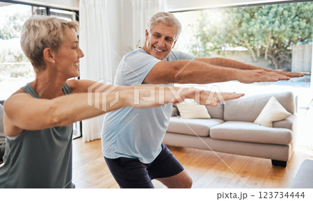 Fitness, retirement and couple squat in home for senior body wellness and vitality in Canada. Happy elderly people in marriage enjoy stretching workout to bond together in living room. 123734444