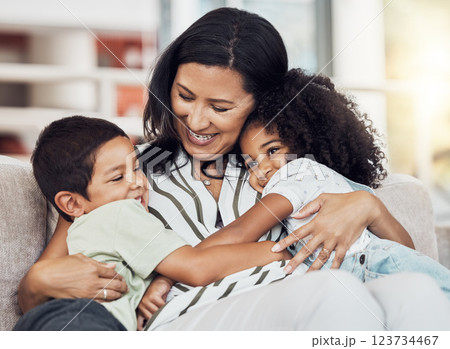 Grandmother with kids in living room, mothers day love and young girl hug grandma in Mexico. Happy elderly woman relax on sofa together, retirement happiness with children and family love small boy Grandmother with kids in living room, mothers day love and young girl hug grandma in Mexico. Happy elderly woman relax on sofa together, retirement happiness with children and family love small boy 123734467