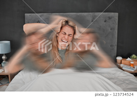 Mental health, bipolar disorder and depressed woman in bed with blur motion showing sad, headache or frustrated suffering. Multiple personalities, stress and lady in pain, emotional and schizophrenia Mental health, bipolar disorder and depressed woman in bed with blur motion showing sad, headache or frustrated suffering. Multiple personalities, stress and lady in pain, emotional and schizophrenia 123734524