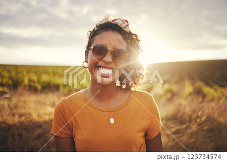 Happy, black woman and summer travel happiness of a person in nature. Portrait of a person from Texas with a smile feeling holiday freedom from traveling in the countryside on vacation break Happy, black woman and summer travel happiness of a person in nature. Portrait of a person from Texas with a smile feeling holiday freedom from traveling in the countryside on vacation break 123734574