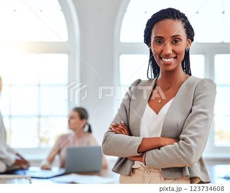 Black woman, entrepreneur and leader stand in office happy, proud or confident in business, project and with cross arms. Portrait, African American female or smile empowerment in successful workspace 123734608