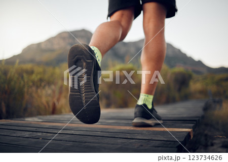 Man, hiking and shoes with legs on mountain for run, workout or fitness. Nature, wellness and exercise for training, sports and health on adventure in summer with hill, sneakers and feet in Australia 123734626