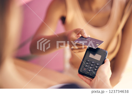 Credit card, retail customer and rfid payment at cashier, store service and point of sale machine. Worker hands process finance, money and shopping, cash register and fintech pos in coffee shop cafe 123734638