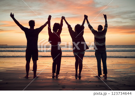 Beach, celebration and friends silhouette, sunset horizon and ocean for night, youth and adventure lifestyle. Freedom, group people shadow holding hands in dark sea with orange background mock up 123734644