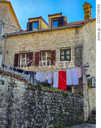 Kotor's Colour: Laundry on a Balcony Among Cobblestone Streets. Kotor's Colour: Laundry on a Balcony Among Cobblestone Streets. 123734648