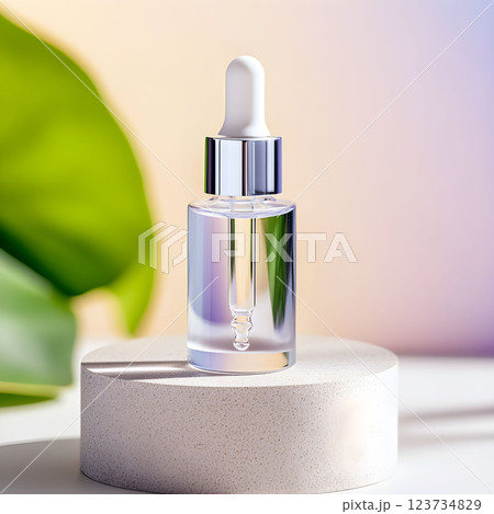 Organic cosmetic bottle featuring a clear serum with a pipette, ideal for aromatherapy and skincare, positioned on a minimalist pedestal against a calming backdrop 123734829