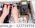 Washing machine repair. Troubleshooting. Washing machine motor failure. 123734938