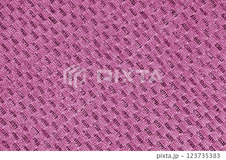 Close up sturcture, texture of pink jacquard fabric with diagonal rough weave background 123735383