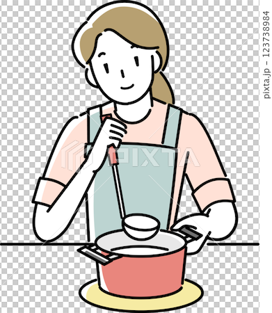A woman wearing an apron cooking A woman wearing an apron cooking 123738984