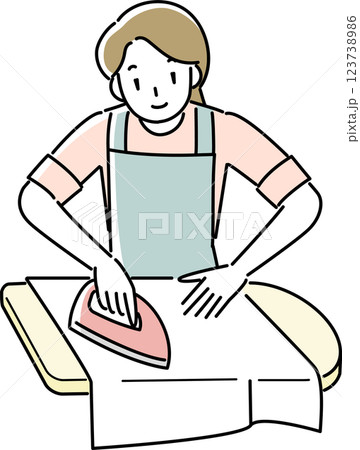 アイロンをかけるエプロンを着けた女性 123738986