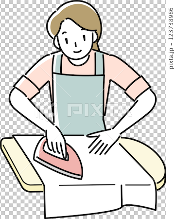 アイロンをかけるエプロンを着けた女性 123738986