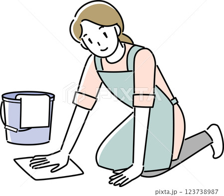 雑巾がけをするエプロンを着けた女性 123738987