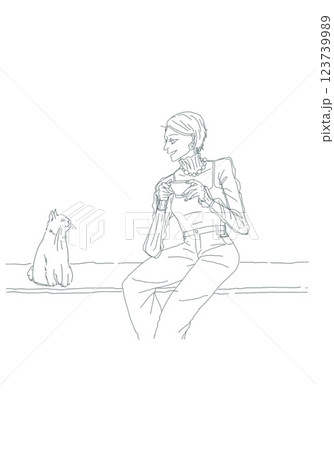 猫とコーヒーを飲む女性 123739989