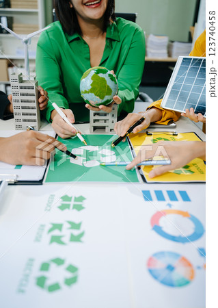 Green business company and Solar Energy Environment city Concept. business team people planning Green business company and Solar Energy Environment city Concept. business team people planning 123740458
