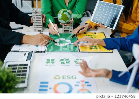 Green business company and Solar Energy Environment city Concept. business team people planning Green business company and Solar Energy Environment city Concept. business team people planning 123740459