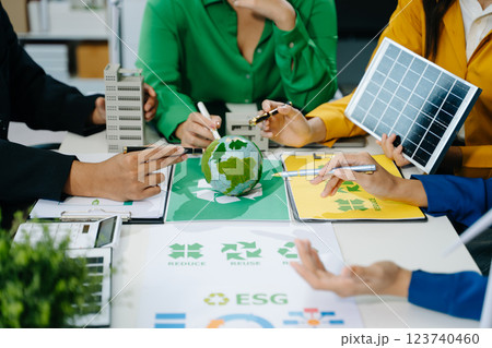 Green business company and Solar Energy Environment city Concept. business team people planning Green business company and Solar Energy Environment city Concept. business team people planning 123740460